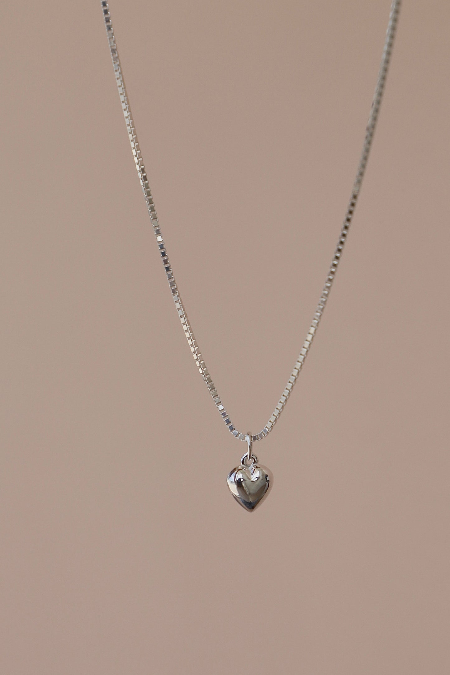 MINI SILVER PUFF HEART CHARM