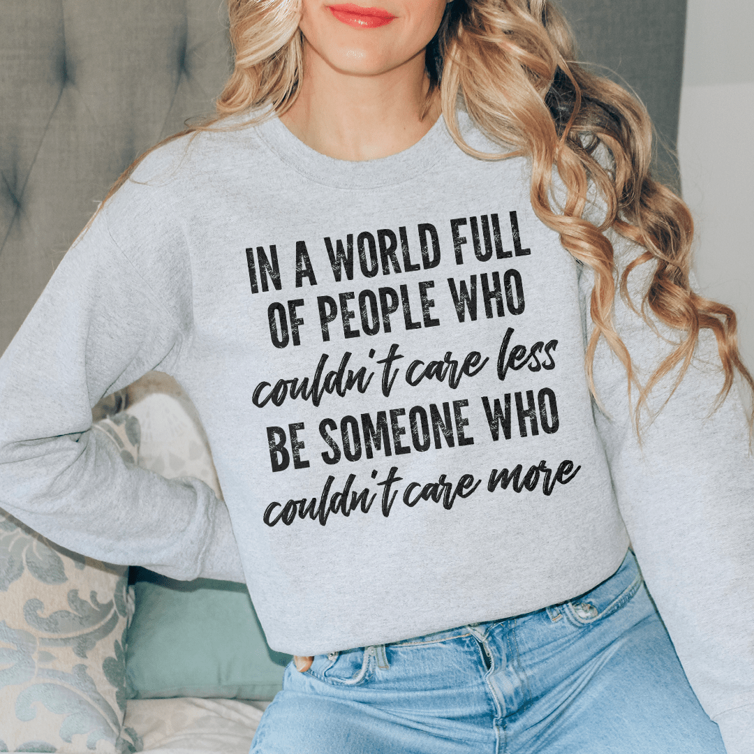 In A World Full Of People Who Couldn't Care Less Be Someone Sweatshirt