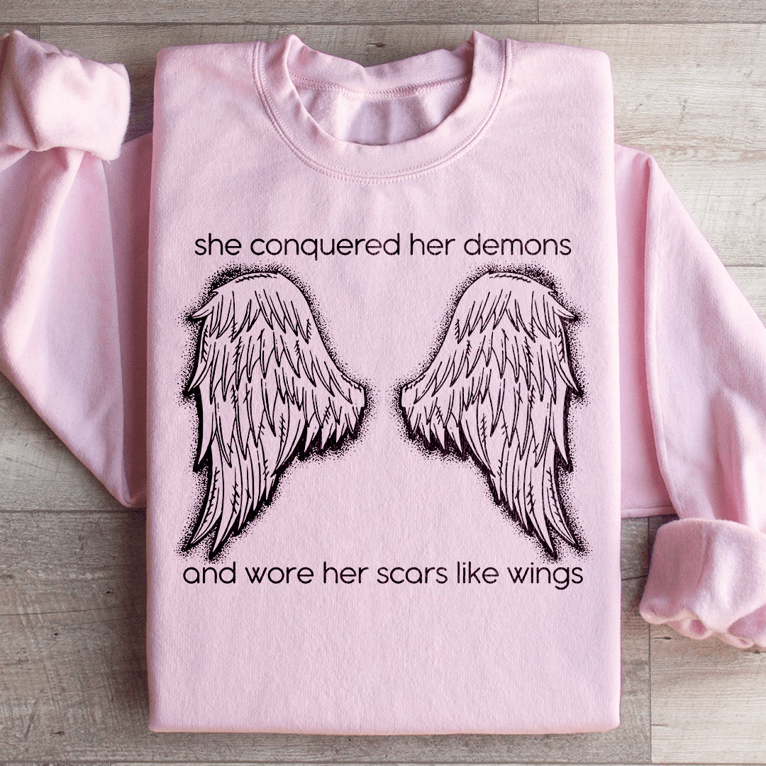 She Conquered Her Demons And Wore Her Scars Like Wings Sweatshirt