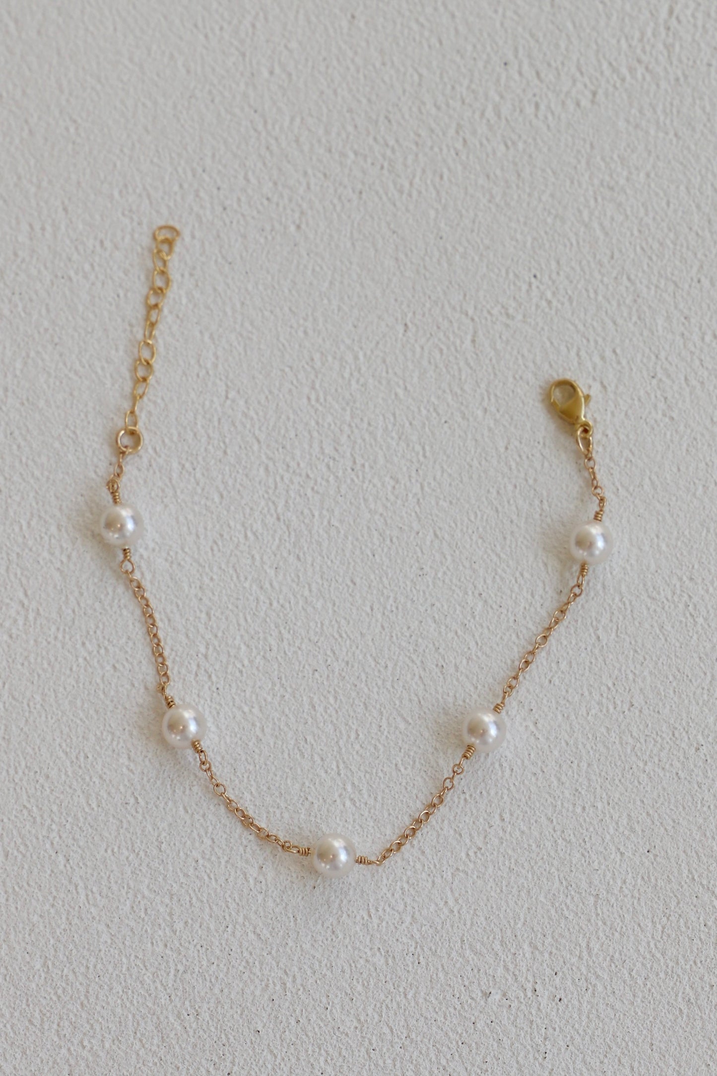 GOLD PEARL STATION BRACELET