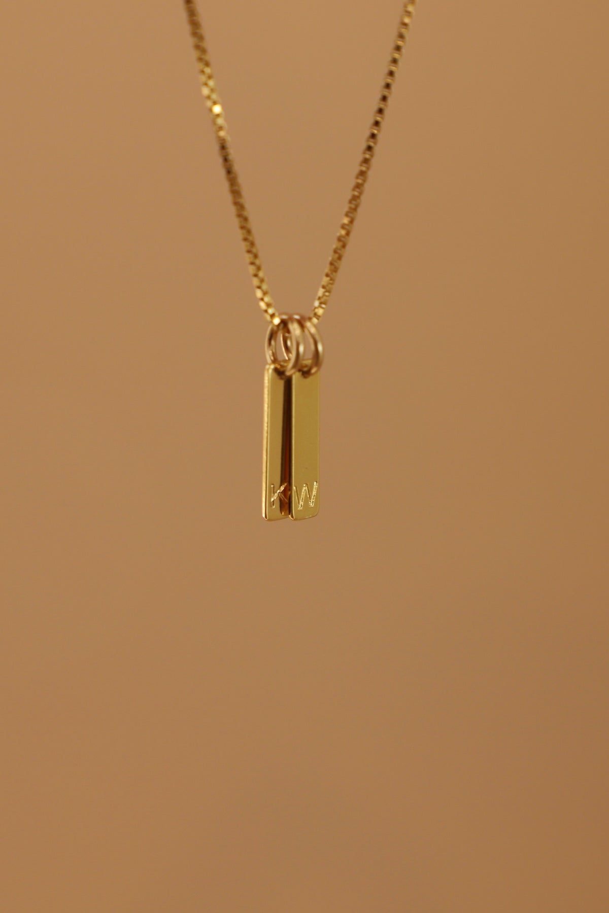 STAMPED INITIAL TAG CHARM