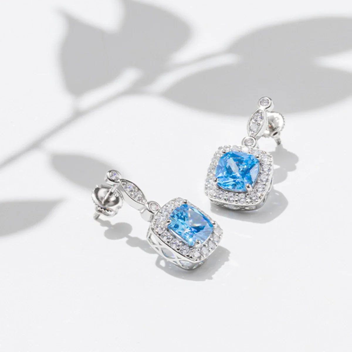 Winter Diamond™ Earrings — 18K White Gold | Cushion Blue Topaz