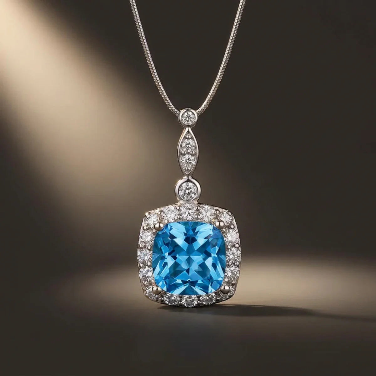 Winter Diamond™ Pendant — 18K White Gold | Cushion Blue Topaz