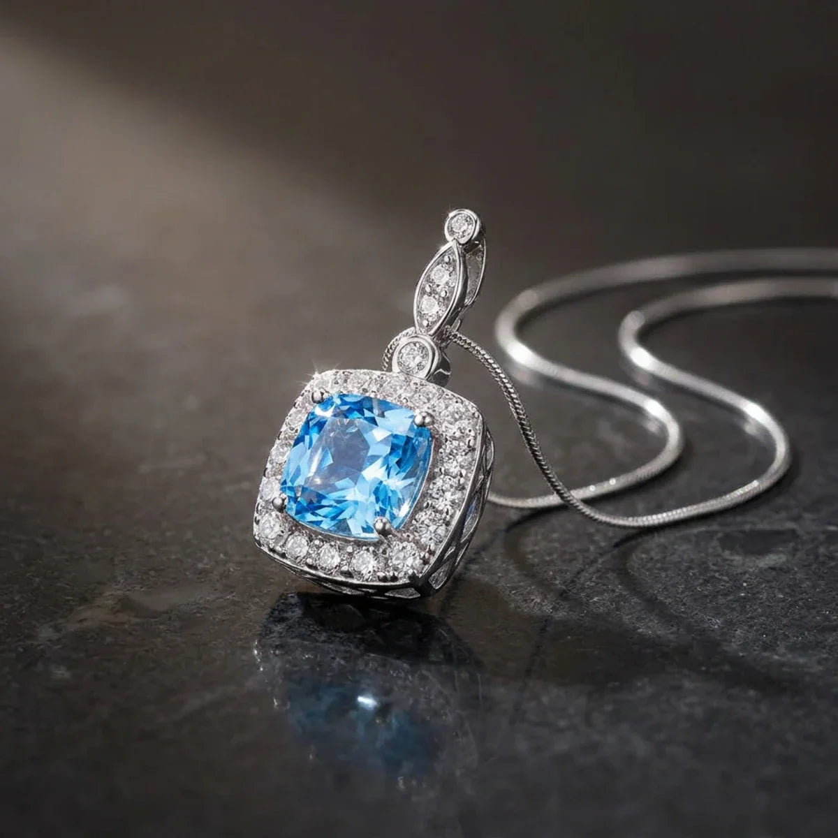 Winter Diamond™ Pendant — 18K White Gold | Cushion Blue Topaz