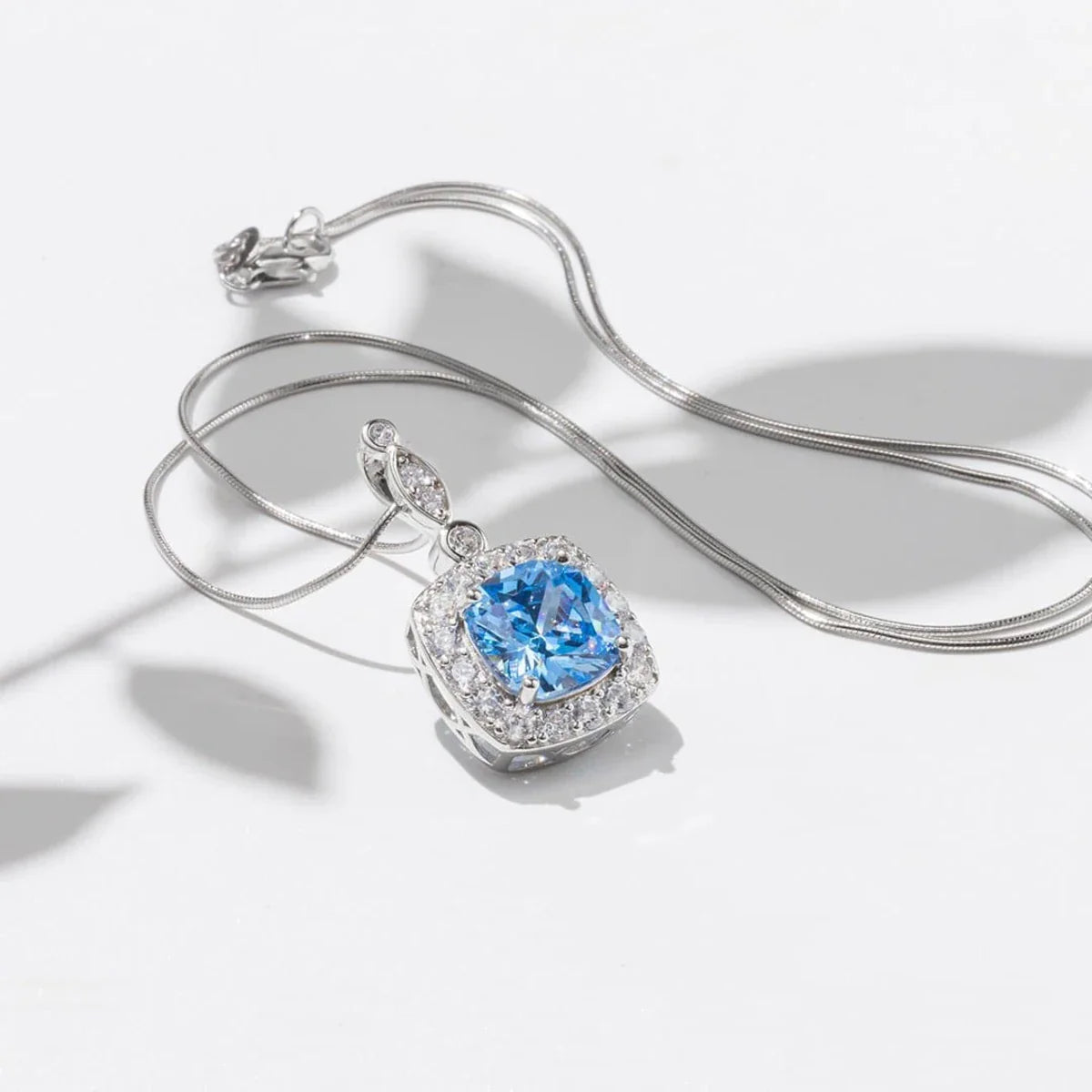 Winter Diamond™ Pendant — 18K White Gold | Cushion Blue Topaz