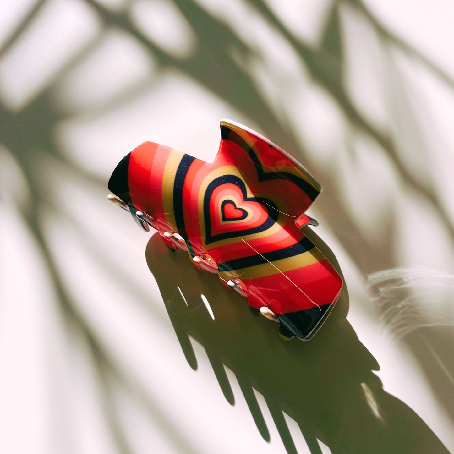 The Foxy in Warm ‘70s Sunrise Hair Claw | Hearts Claw Clip