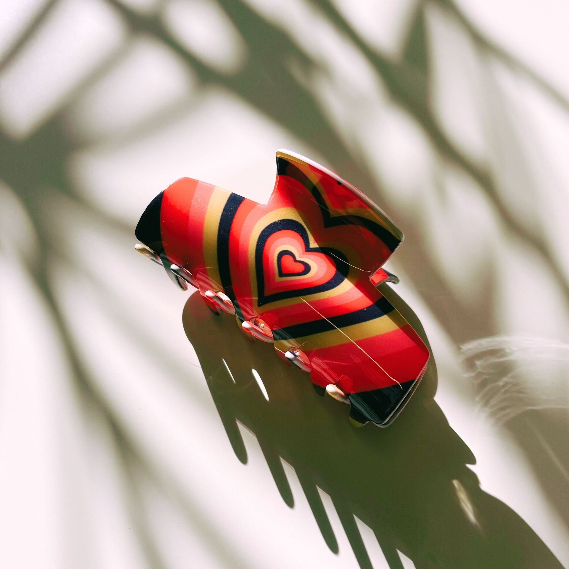 The Foxy in Warm ‘70s Sunrise Hair Claw | Hearts Claw Clip