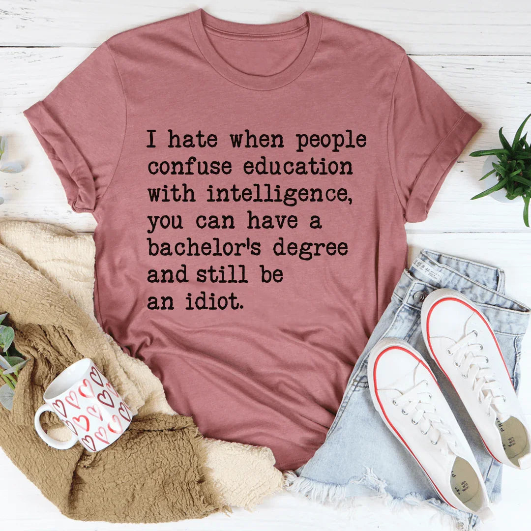 Don't Confuse Education With Intelligence Tee