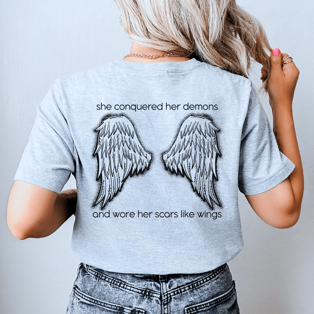 She Conquered Her Demons And Wore Her Scars Like Wings Tee
